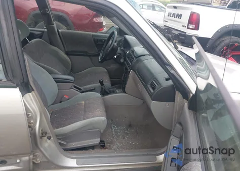 1999 Subaru Forester L from USA, damaged, VIN JF1SF6354XG749831